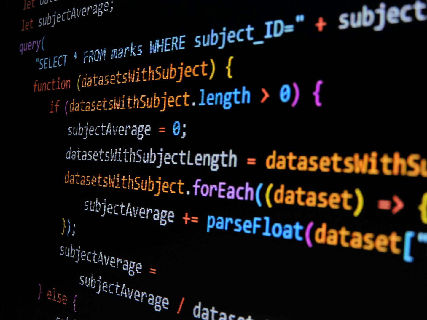 Lines of code on a dark computer screen.